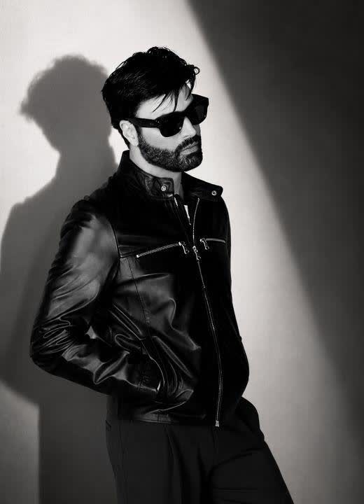 ADOM singer songwriter in a black leather jacket, from the Radar Online feature.